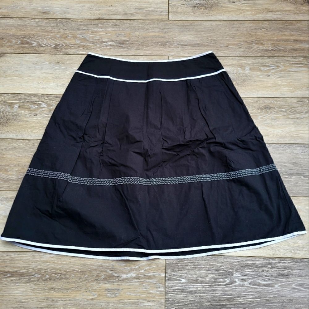 Talbots Petites size 12 lined black skirt with white details on it